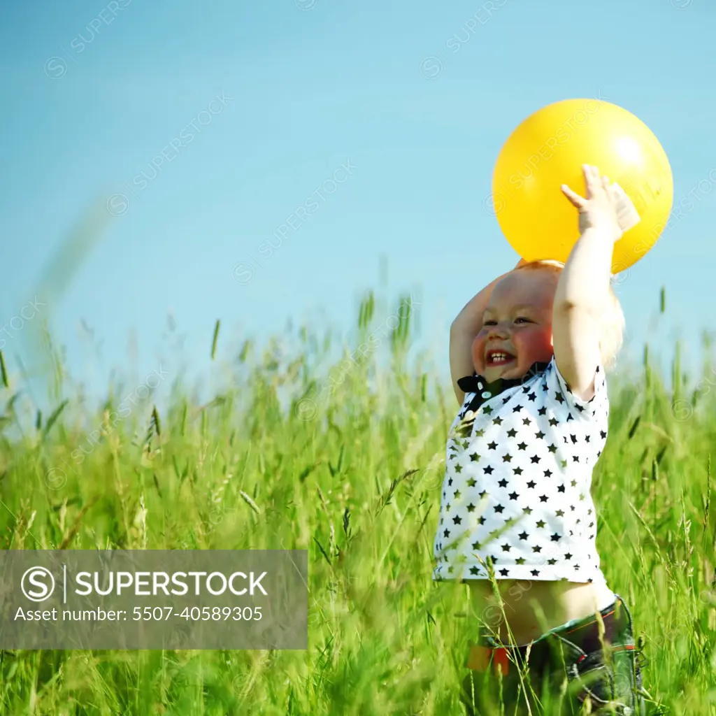 boy in grass