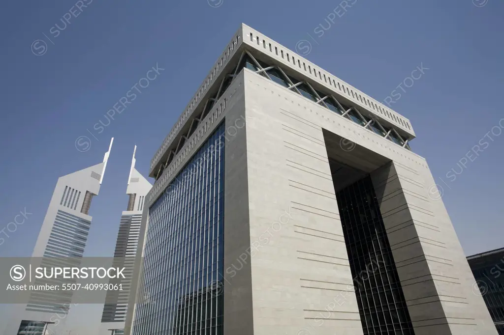 UAE Dubai The Gate building of the Dubai International Financial Centre and the Emirates Towers