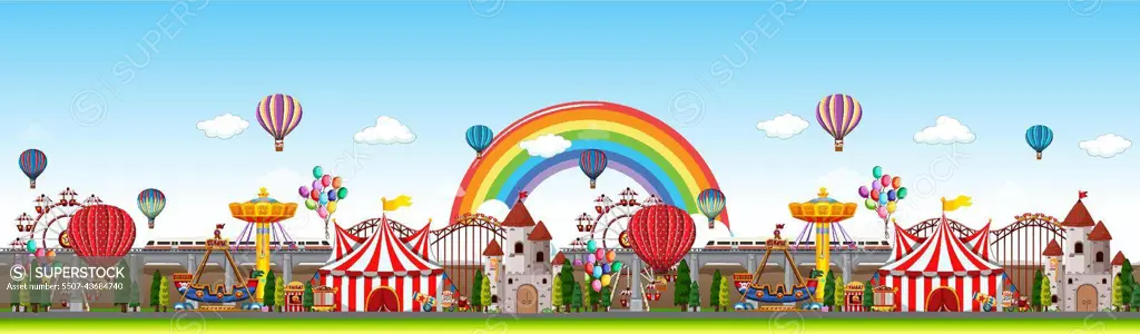 Amusement park panorama scene at daytime with rainbow in the sky -  SuperStock