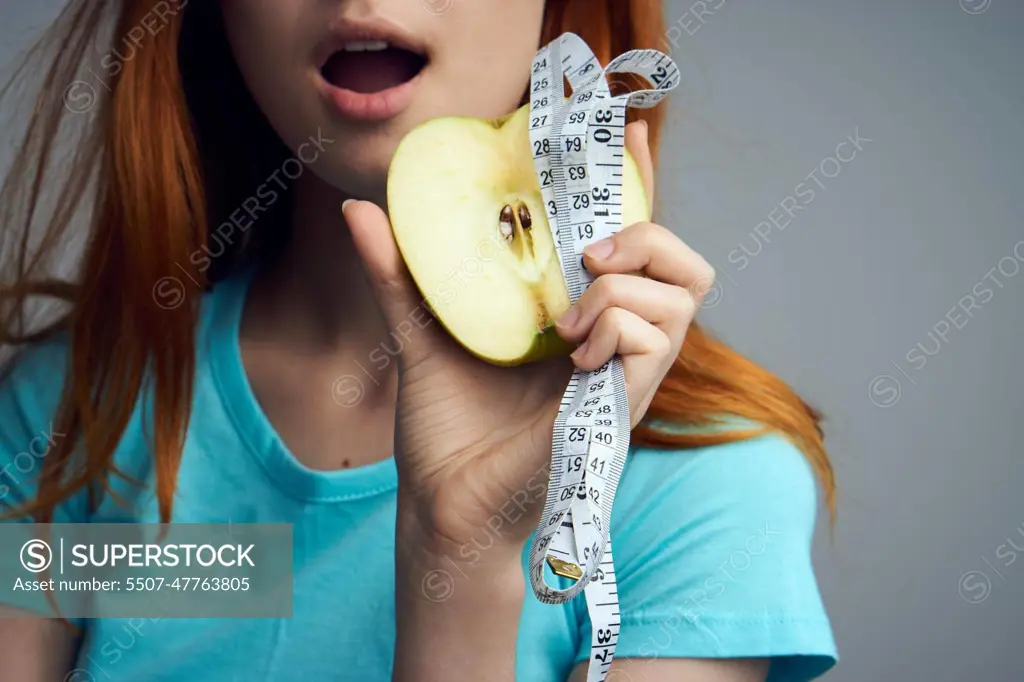 woman with apple in hands diet health vitamins