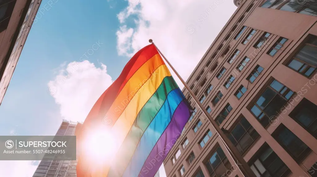 In city downtown, looking up to the sky, LGBT flag a rainbow colored flag. Generative AI weber.