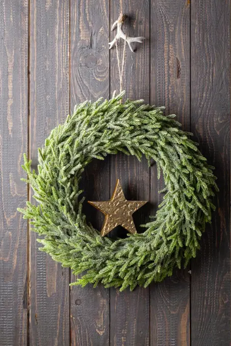 Christmas Wreath Hanging On The Door.