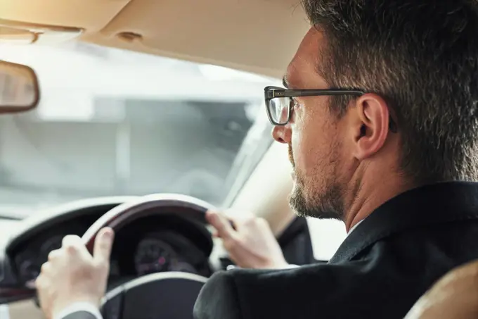 Headed into the office. Cropped shot of a businessman on his morning commute to work.