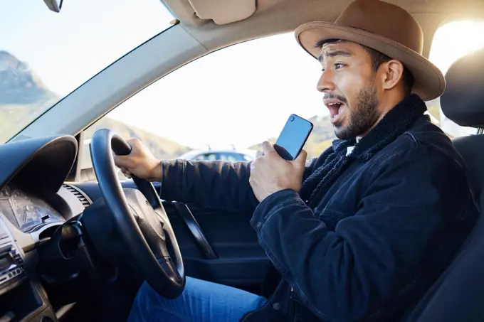 Wherever you get to is better than where you started. Shot of a young man singing in the car.