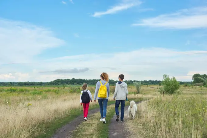 Active healthy lifestyle, children outdoors with dog