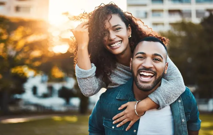 Our love is true love. Portrait of a young couple having fun together outdoors.