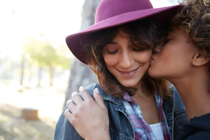 Love is love. a young couple spending the day outdoors on a sunny day.