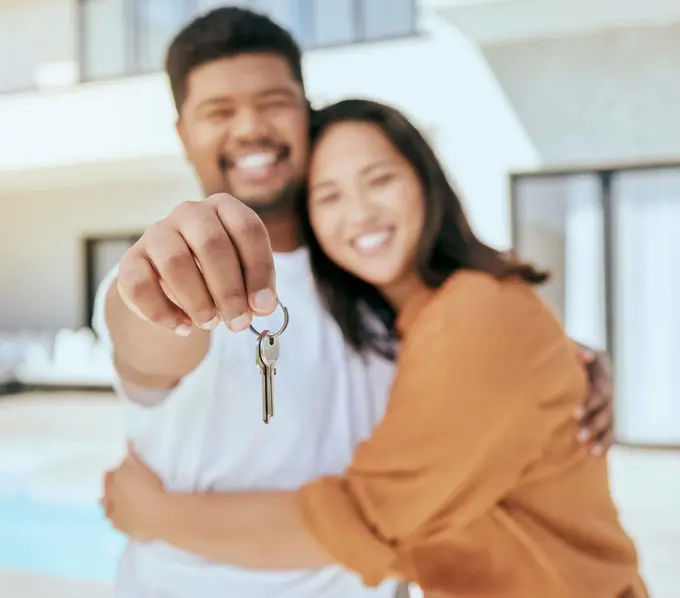 House keys, new home and couple real estate property for sale, buying and rent on home loan, building mortgage and investment. Hands of happy man, woman portrait and homeowner moving to neighborhood