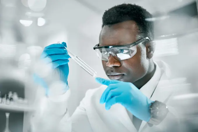 Doctor, test tube or black man in science laboratory on DNA research, medical and medicine data analysis. Covid, healthcare doctor or nurse for health, cancer innovation or virus test study in clinic