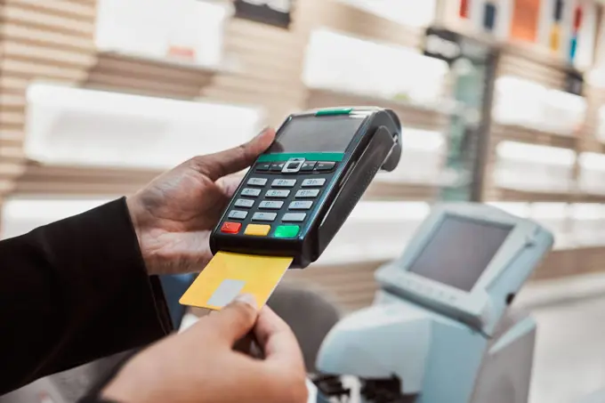 Hands, credit card and machine for banking transaction, ecommerce or payment at clinical store. Hand of customer making purchase or debit insert for electronic pay, bank or buying at optometry shop