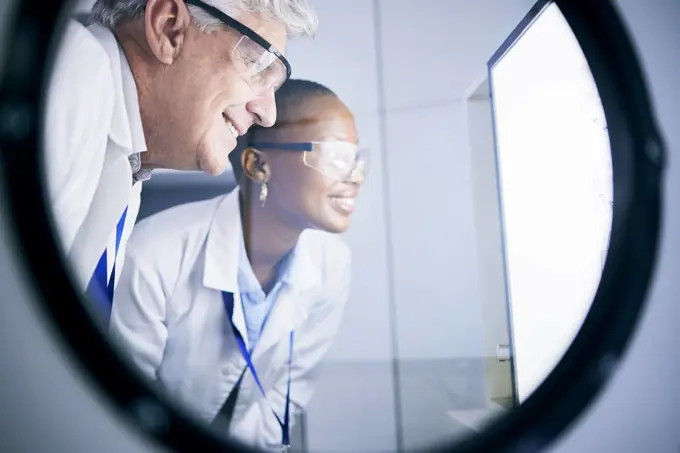 Science, research and team scientists in lab working on future data experiment, analysis or test. Medical, professional and scientific researchers with biotechnology for medical project in incubator.