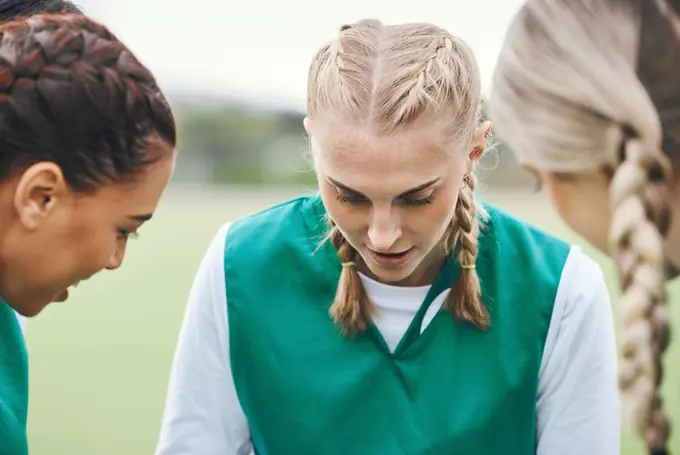 Planning, sports women or team in huddle with support, solidarity or plan for a hockey training game. Group, talk or female athletes in practice for fitness exercise or match together for teamwork