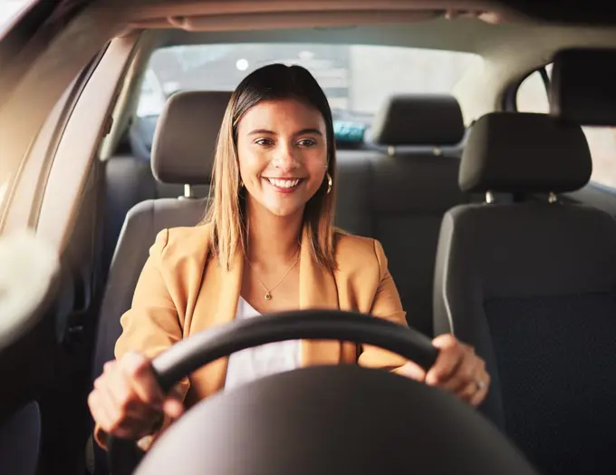 Happy, driving and business woman in car to travel, journey and rent transportation. Smile, driver and person in motor vehicle, automobile and road trip to commute to work in the morning in transport