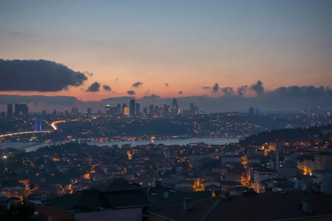 Istanbul cityscape below clouds