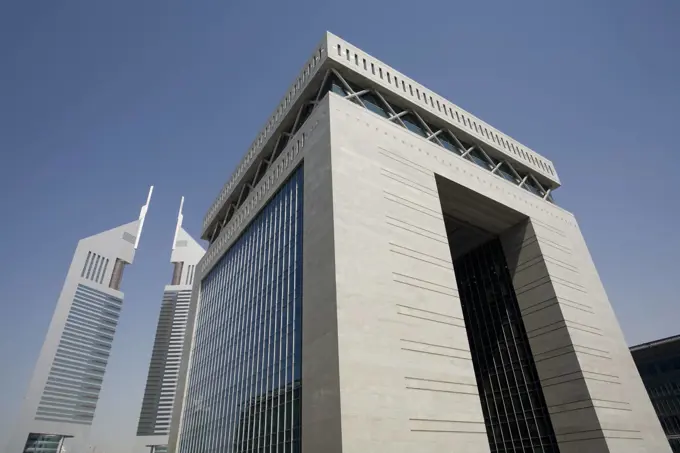 UAE Dubai The Gate building of the Dubai International Financial Centre and the Emirates Towers