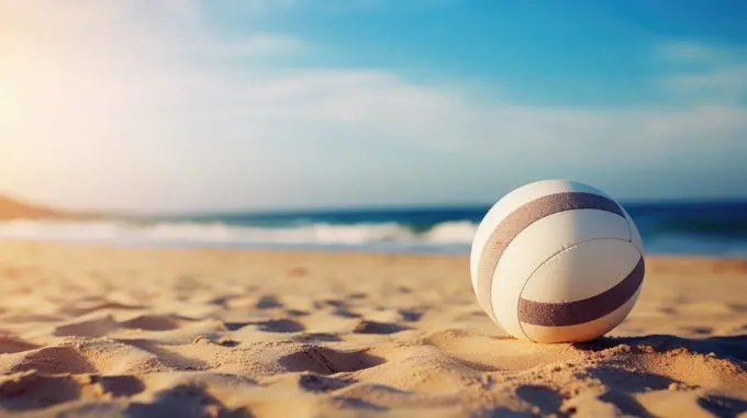 Volleyball ball on a sunny beach. Background for sporting events