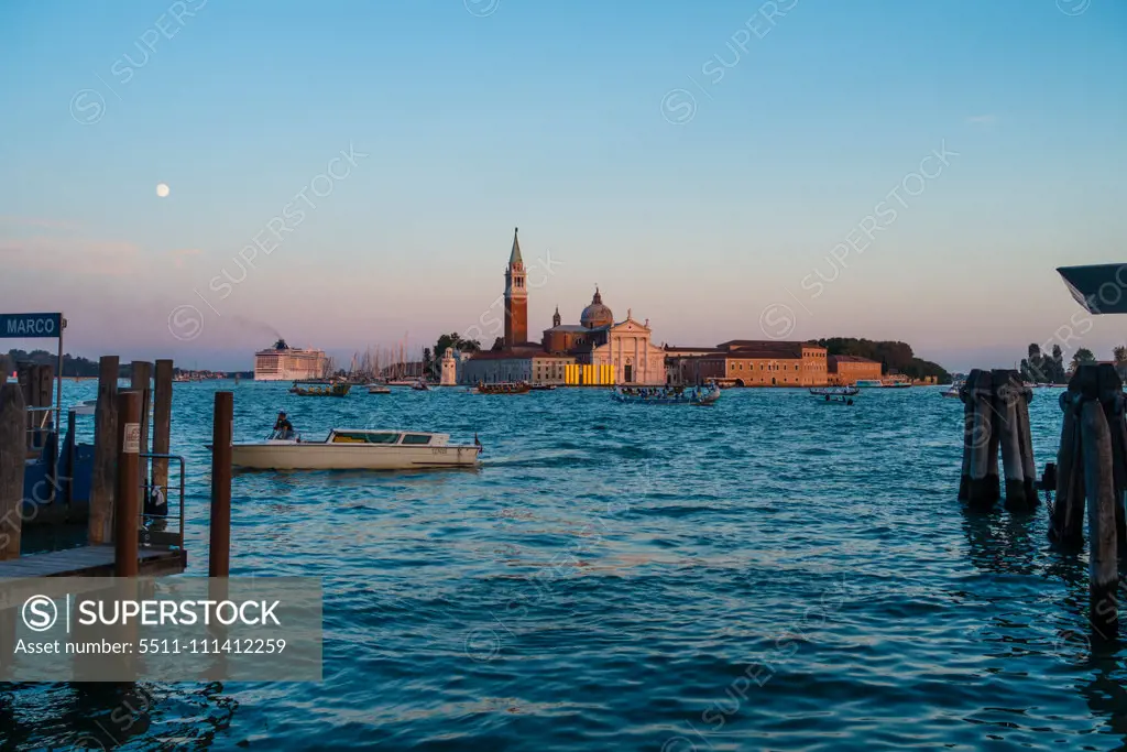 Cruise ship MSC Fantasia, Island of San Giorgio Maggiore in Venice at sun-set, Venice, Venetia, Italy