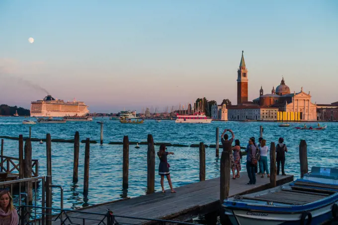 Cruise ship MSC Fantasia, Island of San Giorgio Maggiore in Venice at sun-set, Venice, Venetia, Italy