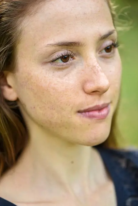 Yound woman in her garden, near Vienna, Austria (model-released)