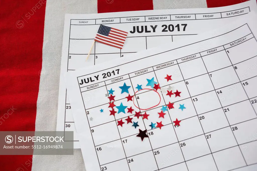 Calendar marked with star shape decoration and American flag with 4 th july theme