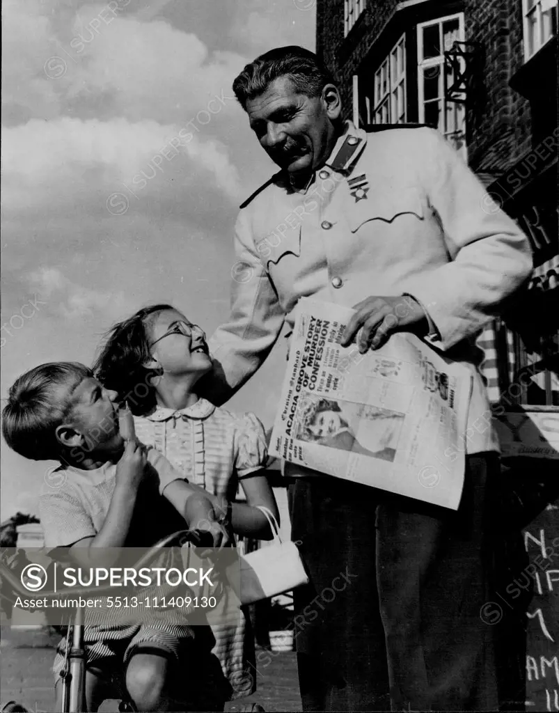 Uncle Joe and the children, This unusual picture - guaranteed not to be Soviet propaganda - was taken in the main street of Boreham Wood, Herts, when Polish screen actor. Stanislav Zienciakiewicz walked out of the nearby Associated British studios to buy a paper aril made friends with two local children. Stanislav plays the part of Stalin in Mario Zampi's new topical comedy "Top Secret". March 11, 1953.