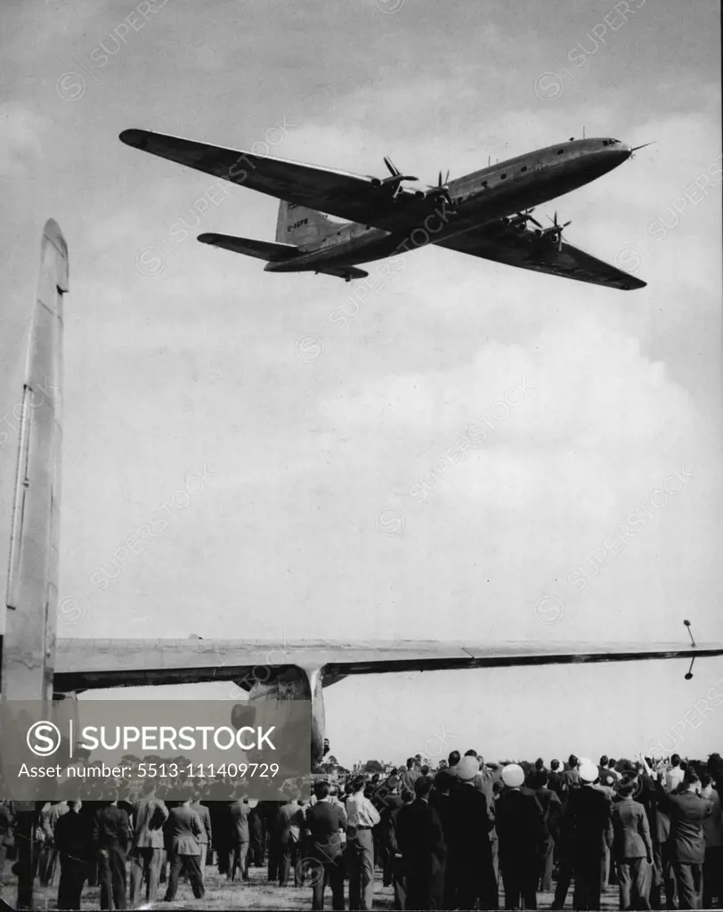 Brabazon' Flies Over Farnborough -- The Brabazon flying over a Handley Page Marathon I (on the ground) at Farnborough to-day. The world's largest civil landplane, the 130-ton Bristol 'Brabazon I', flew over Farnborough Aerodrome, Hampshire, to-day (Thursday), making a low-level run down the full length of the field. The 'Brabazon', which made her maiden flight only last Sunday, had flown from Filton, Bristol, to Farnborough, where the tenth Flying Display and Exhibition organized by the Society