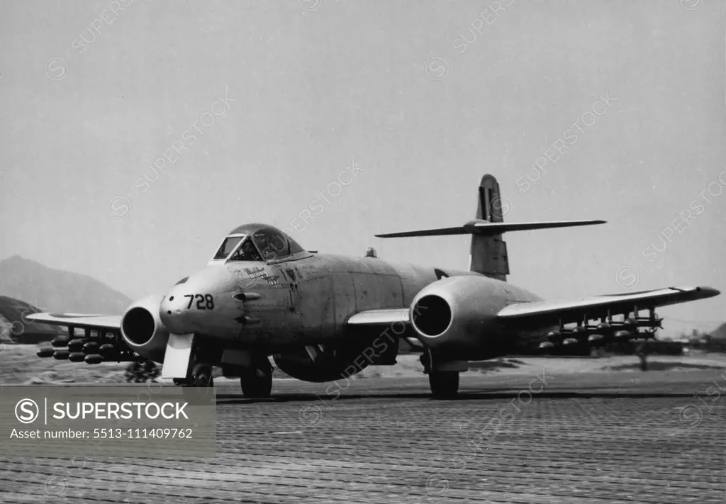 Taxying flown the tarmac before taking off from Kimpo which was one of the squadrons bases in Korea, this Meteor Jet fight of No. 77 Squadron RAAF is armed with sixteen death-dealing rocket projectiles. Within a short period after this picture was taken, this aircraft had strafed and raked Communist target with rockets and cannon shells. January 12, 1955. (Photo by RAAF Official Photo).