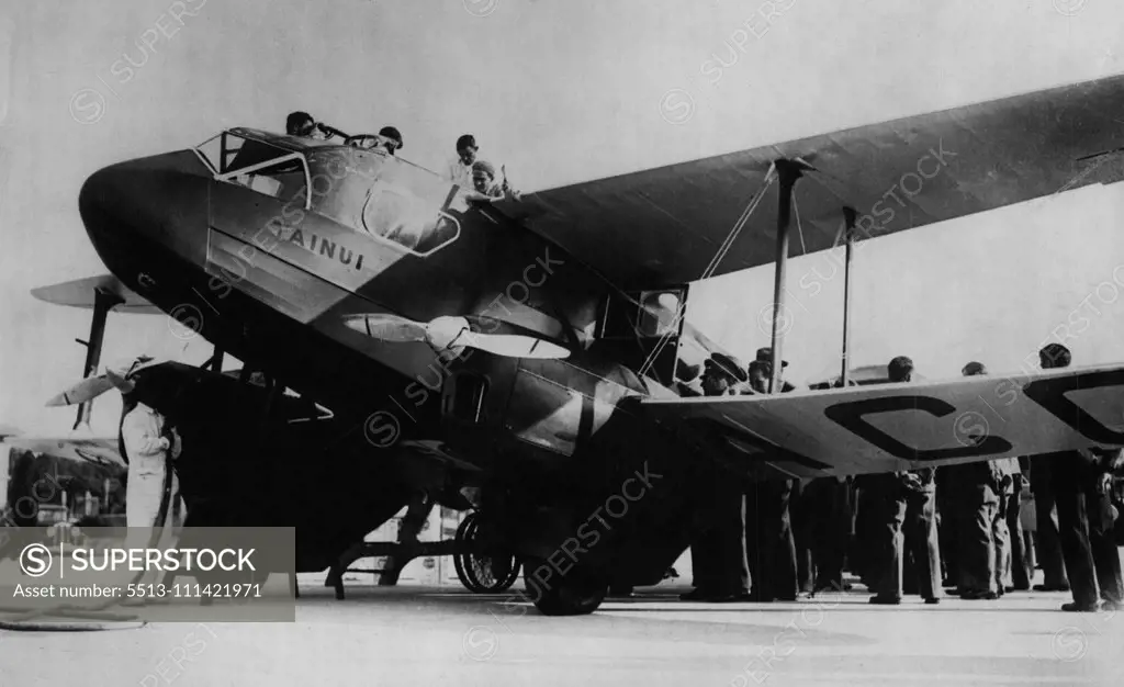 Melbourne Air Race Flyers Pass Through Rome -- J.H. Hewett and C.E. Kay's D.H. Dragon machine photographed on arrival at Rome, during the air race to Melbourne. October 22, 1934. (Photo by Keystone).