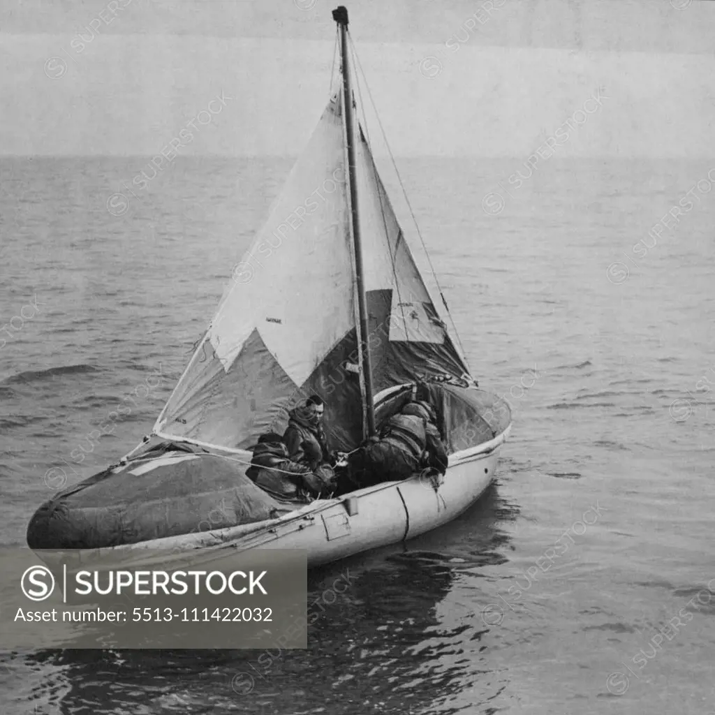 Rescue By Airborne Lifeboat -- Rescue from the sea by lifeboats dropped from aircraft is now a feature of the work of R.A.F. Coastal Command Air-Sea Rescue Service lifeboats, fitted with two-stroke engines,  a height of 700ft, sails set and engines ready, a rescued crew sails for home. March 2, 1945. (Photo by Topical Press).