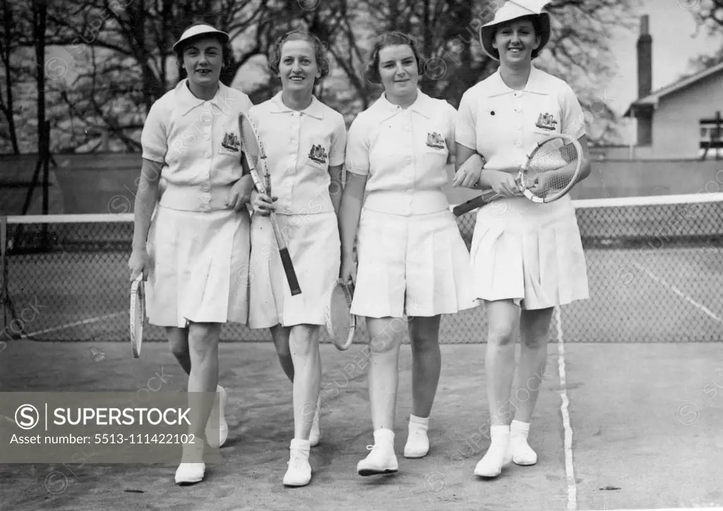 Australian Ladies' Tennis Team In Action: The four ladies of the Australian tennis team wearing unusual hats at Epsom to play April 17. (left to right) Miss D. Stephenson, Mrs. Hopman (captain) Miss Heima Coyner, Miss Nancy Wynne. The Australian ladies tennis team attended luncheon at the R.A.C. country club at Woodcote Park, Epsom, today April 17 and partnered members of the international club in the annual mixed doubles competition for the king of Sweden's cup. March 01, 1952. (Photo by Associ
