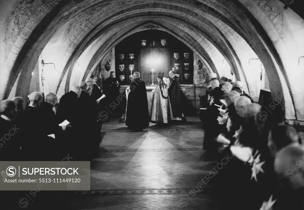 Picturesque Ceremony -- The ceremony in the crypt chapel which the Archbishop of Canterbury (wearing mitre) was enthroned as Prelate of the Order. The annual service of the Order of St. John was held among the ruins of the Priory Church, Clerkenwell, London to-day. June 24, 1946.