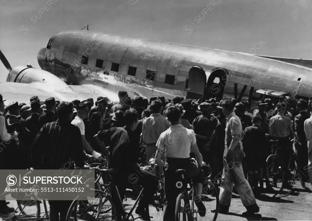 The giant £41,000 Douglas airliner Kyilla and most powerful plane Australia, was surrounded by a crowd of air-minded when it reaches Kingsford Smith Airport today Melbourne. November 12, 1937.