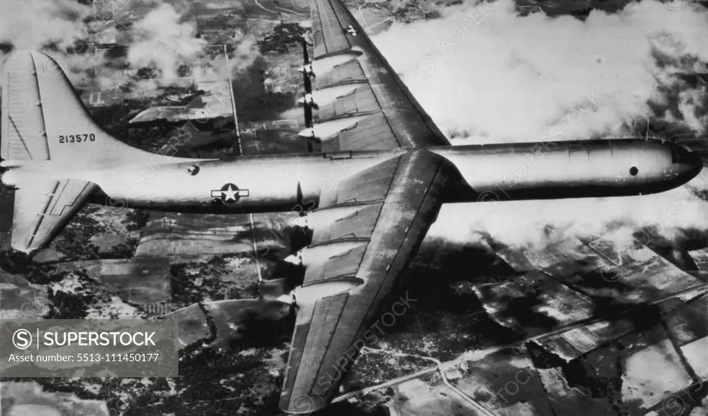 Round-Tripper for The World -- The Army Air forces said today that its new Six-engine B-36 bomber, shown on one of its test flights, "could carry an atomic bomb to any inhabited region in the World and return home without refueling in the event of an enemy attack." The AAF said production had started on the bomber which has been described as the Worlds largest. November 06, 1946. (Photo by AP Wirephoto).