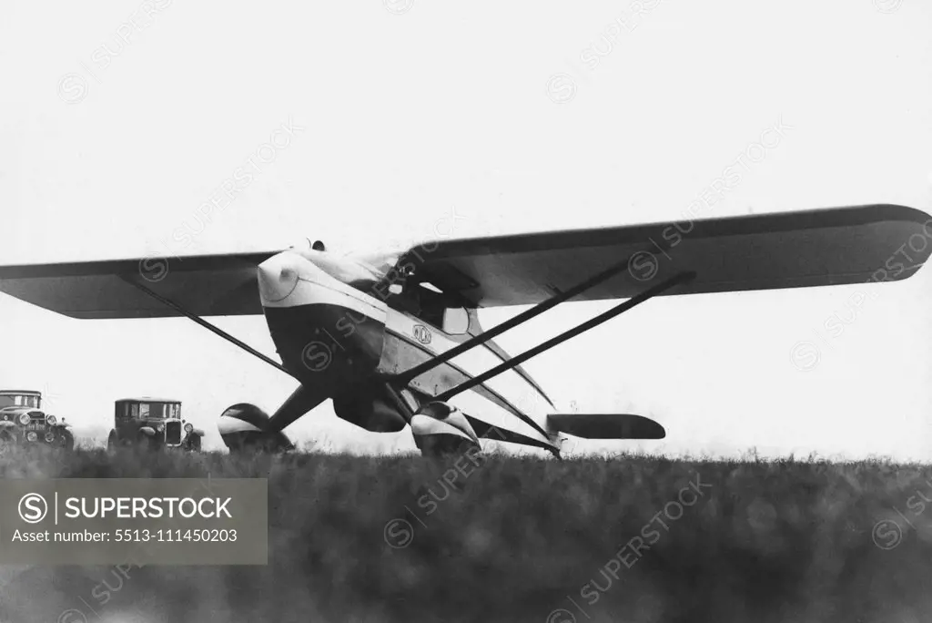 Flying With A Ford V. 8 Engine - The "Wicko" at Gravesend Aerodrome. Mr. C.N. Wilkner, an Australian from Brisbane, has designed and-is flying a two-seater light aeroplane powered by a Ford V. 8 Engine unit. The machine, which has American tendencies, in design, is called he "Wicko", and has a top speed of 115. m.p.h., cruises at 100 m.p.h., and lands at 59. m.p.h., It will be marketed at 375, This is the first time a Ford engine has been used in a light 'place in England. October 26, 1936. (Pho