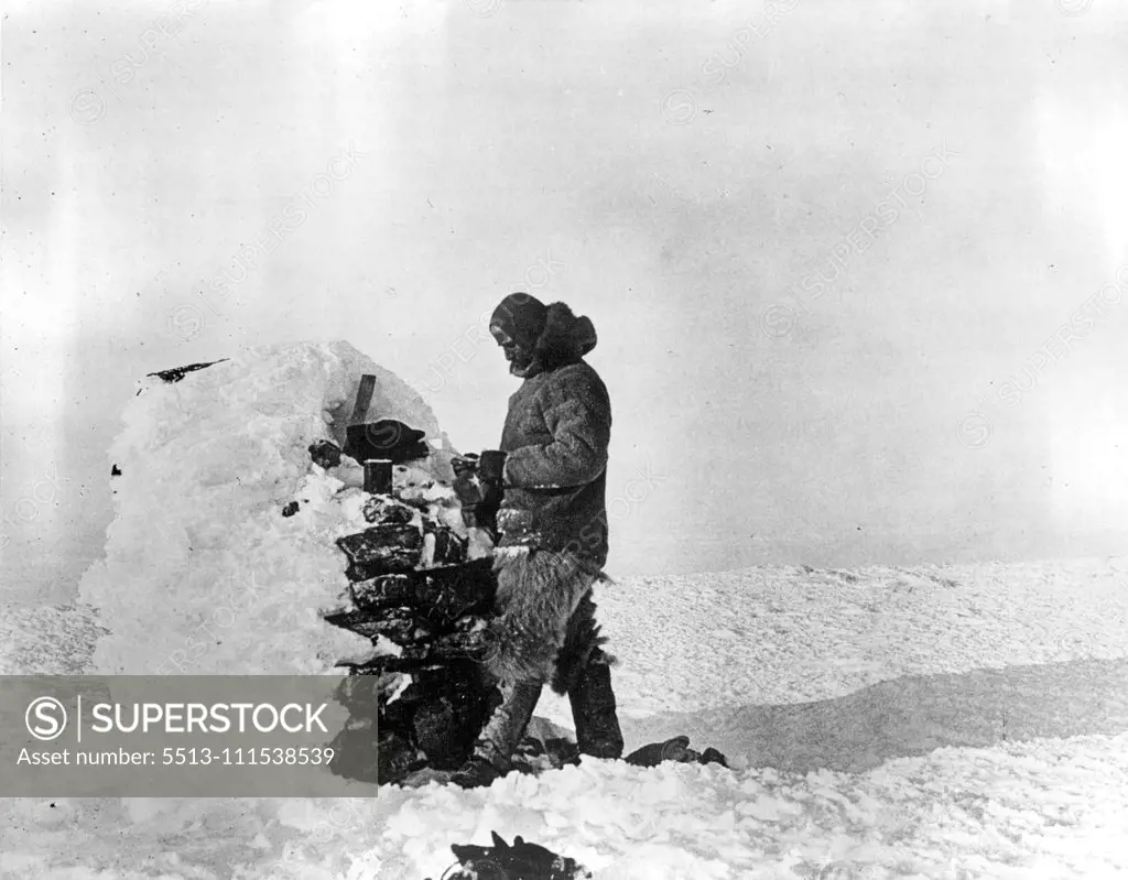 With MacMillan's Expedition into the Arctic: Remarkable photographs taken by Donald MacMillan, Arctic explorer on his most recent expedition into the furthermost icy regions of the north. MacMillan finding peary's cairn and record at cape Thomas Hubbard. October 24, 1924. (Photo by International Newsreel Photo).