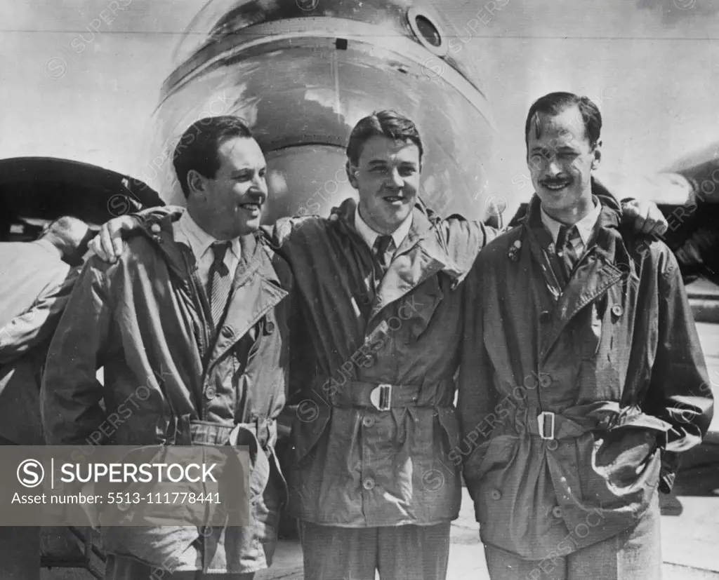 Crew Of Record Breaking Canberra -- The crew of the English Electric Canberra pose after Landing at the Olenn L. Martin plant here today. From left they are R.H. Rylands, R.P. Beamont, and D.A. Watson. The twin-jet Canberra Bomber set an East-West Atlantic crossing record last week. It made the 2,072.79-mile trip in four hours and 15 minutes. September 4, 1951. (Photo by AP Wirephoto).