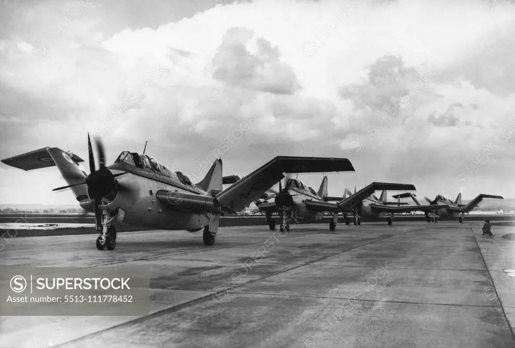 New Aircraft for The Royal Navy. The "Gannets" ***** on the runways after a flight ***** the remarkable features of this *****. The Royal Navy's first unit of Fairey "Gonnet" aircraft, designed solely ***** anti-submarine work, was officially inaugurated at the Royal Naval ***** at Ford, Sussex. Now a "super priority" aircraft ***** "Gannet" will eventually replace the ***** built "Avenger" now serving with the *****. April 6, 1954. (Photo by Sport & General Press Agency, Limited).