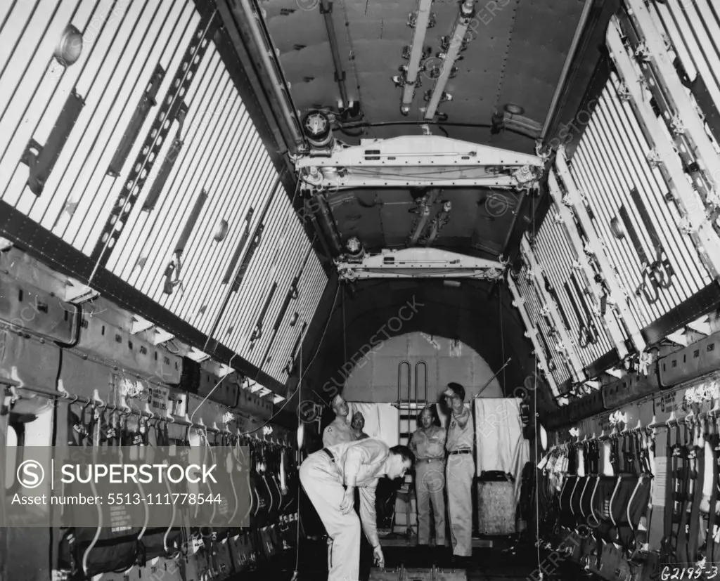 Roomy Interior The cavernous cargo hold of a U. S. Air Force C-124 "Globemaster II" demonstrates the vast cargo- carrying potential of the giant transport. Being tested under field conditions, and flying with other transports engaged in the Korean airlift by the Far East Air Forces 315th Air Division (Combat Cargo), the Globemaster will carry approximately 30 tons of cargo on a single flight in the Korean airlift, more than three times the amount carried by the C-54 Skyraaster, previously the la