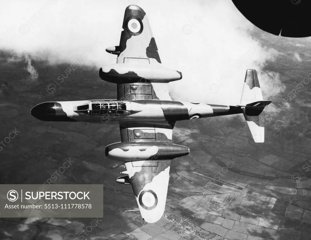 Plan at Elevation Seen from above as it flies high amid the clouds is an Armstrong Whitworth N. F. 11 night fighter. A standard night fighter of the Royal Air Force, the N.F.11 is powered by two Rolls-Royce 'Derwent' gas turbines and has four 20mm. cannon mounted in pairs in the wings outboard of the engine sacelles. Her radar equipment is carried in the extended nose. The aircraft has a wingspan of 43 feet, a length of 48ft. Gin. and an overall height of 13ft. 11in. July 18, 1954. (Photo by Reu