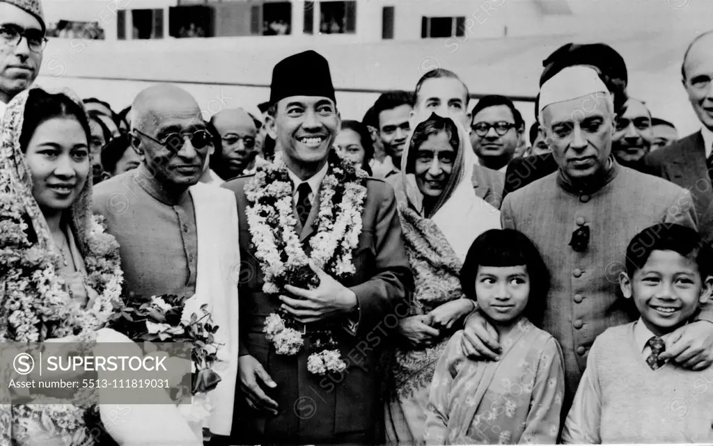 Indonesian President Visits India - (Left to right) Sheikh Abdullah; Mrs. Soekarno; Shri Rajagopalachari; President Soekarno; Rajkumari Amrit Kaur, and Pandit Jawaharlal Nehru. President Soekarno of the United States of Indonesia, accompanied by his wife arrived at Wellington airport, Delhi, India, Jan. 24. Those who received him at the airport were the Governor-General Shri Rajagopalachari; Pandit Jawaharlal Nehru, premier of India; Rajkumari Kaur, Abdullah, prime minister of Jammu and Kashmir.