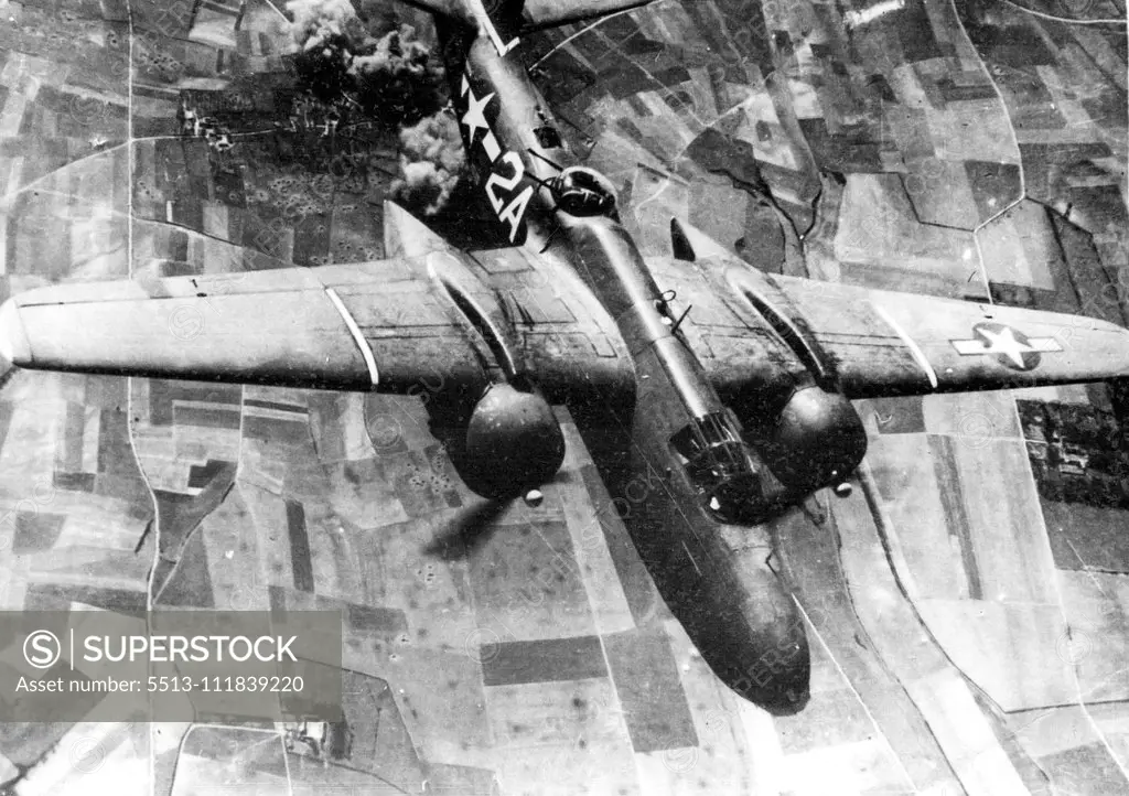 A-20's Skip Bombers. Leaving a target several thousand feet below engulfed in smoke and flames, a trim, speedy A-20 Havoc light attack bomber of the U.S. Ninth Air Force is shown streaking for its base in England is after a recent attack against one of Hitler's defences on the continent. The versatile A-20's have been operating from England for several weeks, and form a component of the Ninth Air Force's highly mobile bombing fleet which will support allied ground forces during the forthcoming e