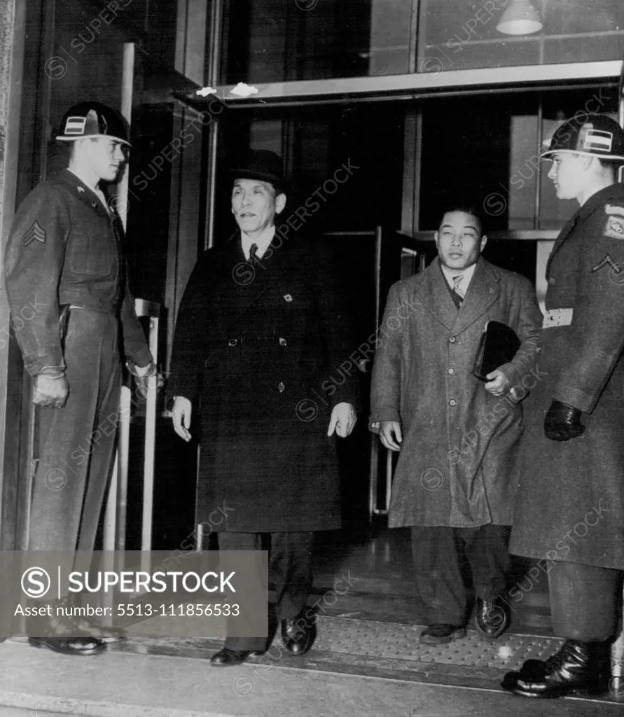 Japan's New Premier After Visit to Mac Arthur -- Dr. Hitoshi Ashida (second from left), new Japanese premier, leaves headquarters of General Douglas MacArthur after paying his first official visit to the general. Ashida succeeds Tetsu Katayama who resigned. February 29, 1948. (Photo by AP Wirephoto). ;Japan's New Premier After Visit to Mac Arthur -- Dr. Hitoshi Ashida (second from left), new Japanese premier, leaves headquarters of General Douglas MacArthur after paying his first official visit