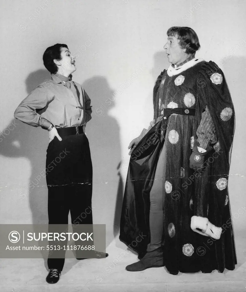 Sir Cedric and Lady Hardwicke. 22, Lady Hardwicke has fun at the sight of Sir Cedric's tights which he wears as Edward IV in Sir Laurence Oliver's production of Richard III at Shepperton Studios. December 21, 1954. (Photo by Jack Esten).;Sir Cedric and Lady Hardwicke. 22, Lady Hardwicke has fun at the sight of Sir Cedric's tights which he wears as Edward IV in Sir Laurence Oliver's production of Richard III at Shepperton Studios.