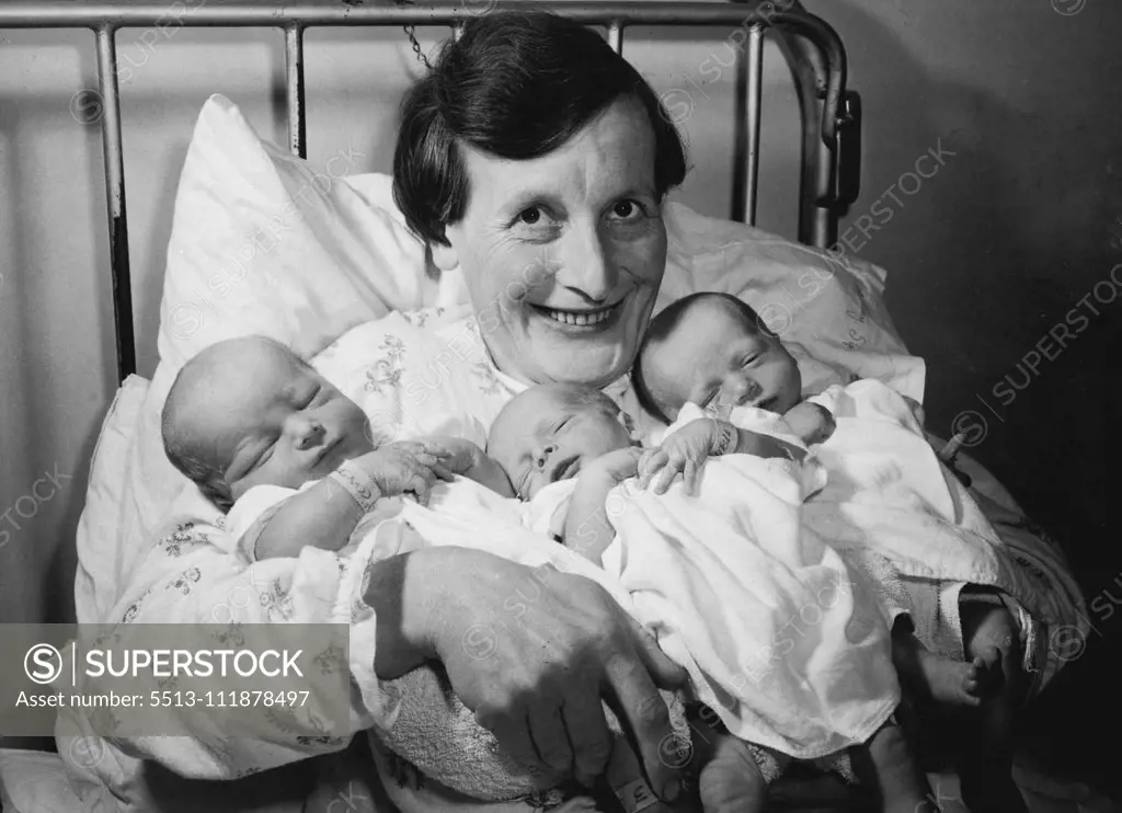 Ernie Constable, 38, set to work yesterday clearing furniture from the front room of his house.Ernie, a £12-a-week cement worker, had to find room for three babies, bringing his total to 17.His wife, Mabel, 37, (pictured) gave birth in hospital to triplets two boys and a girl The baby girl weighed 6lb 1oz, and her brothers 4lb 13oz and 7lb 2oz. Room Problem - Non-smoker, non-drinker Ernie has found it difficult enough to find room for 16 people in his three-bedroom home at Long Itchington, Warwi