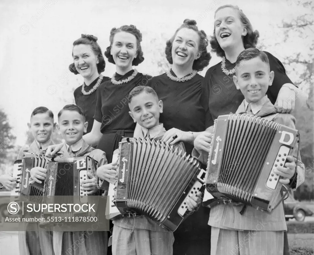 When Quads Meet Quads - Swing music by two sets of Texas Quadruplets was a feature at the twins convention in Waco, Tex., March 24. The Perricone's (l to r) Anthony, Bernard, Carl and Donald swung their accordions for a vocal rendition by the key sisters, (left to right), Roberta, Mona, Mary and Leota. March 25, 1939. (Photo by Associated Press Photo).