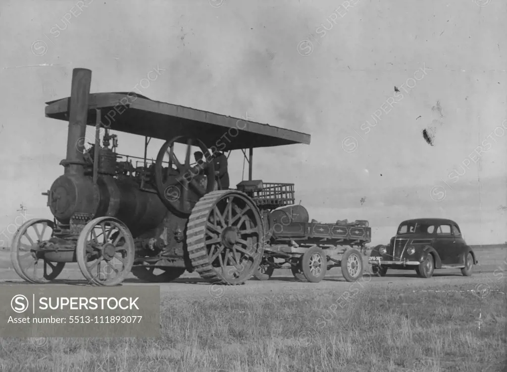 30 years old traction engine lowed cars to Melbourne. July 25, 1943.;30 years old traction engine lowed cars to Melbourne.