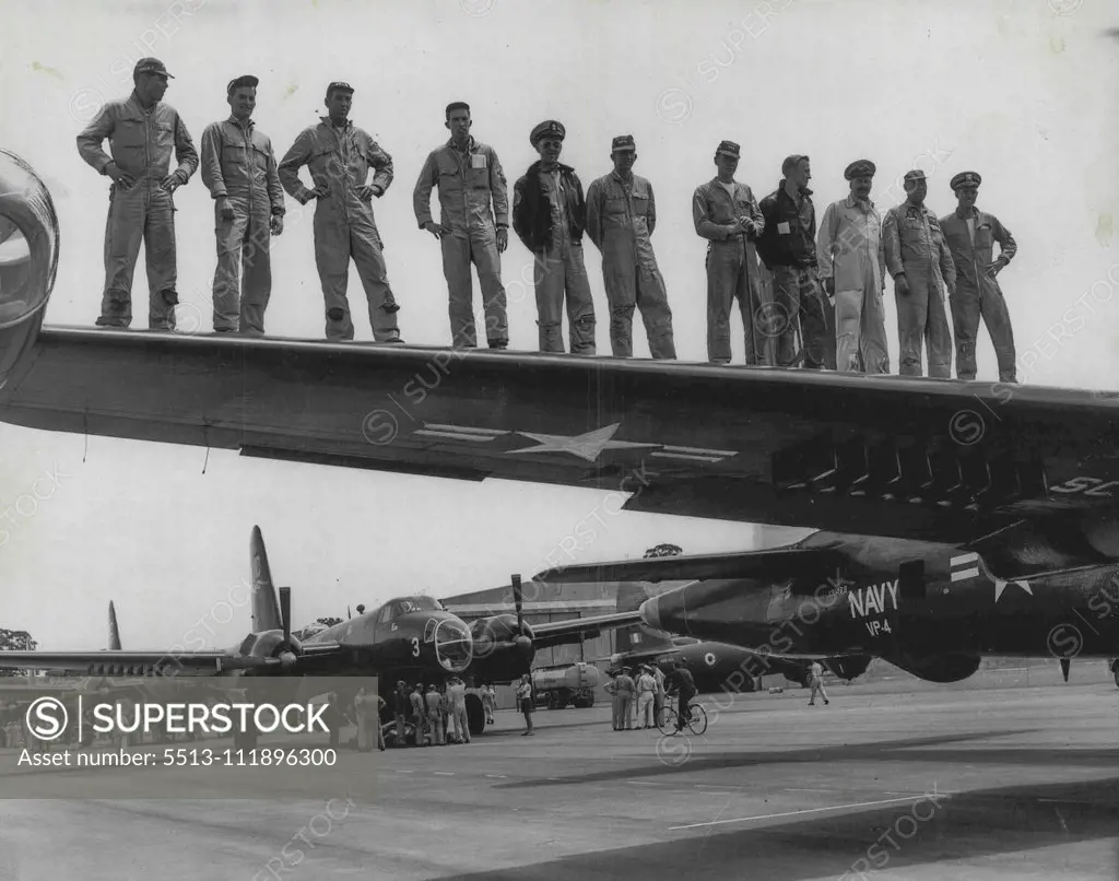 American patrol planes arrive, from their far Eastern base. The five Lockheed Neptune long range anti submarine plane belonging to the US navy at Richmond showing the crew of one on the wing of the giant. They are visiting nearly all states and New Zealand before flying on to USA. They have been stationed at Okinawa. November 18, 1955. (Photo by Gordon Herbert Short/Fairfax Media).;American patrol planes arrive, from their far Eastern base. The five Lockheed Neptune long range anti submarine pl