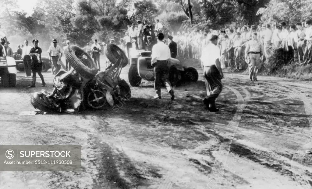 Two killed in Auto Race Smashup -- Cars in which two drivers killed lie in the track a few minutes after a multiple smash up at Lakewood Park here today. George Robson, winner of the 1946 Indianapolis classic, was killed in car left, and George Battinger of San Antonio, Texas, was killed in car at right and behind. September 02, 1946. (Photo by AP Wirephoto).