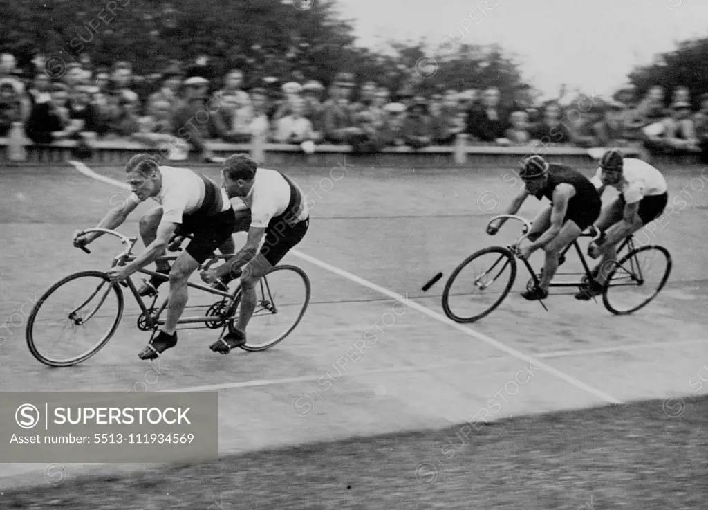 German Riders' Great Win -- Richter and Merkens leading Sibbit and Horn, during the race. Famous German cyclists, Albert Richter the world's amateur champion and Tony Merkens, were successful against the English riders J.E. Sibbit, the national sprint champion and D.S. Horn, N.C.U.26 miles title holder, at the meeting of cycling champions at Herne Hill. The two continental riders beat the Englishmen in a tandem match over two laps (1,006 yds) by half-a-dozen inches. October 24, 1932. (Photo by