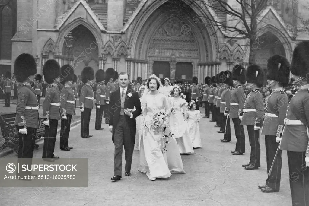 The Queen's Niece Marries; Lord Anson -- The marriage of Miss. Anne-Bowes Lyon, a niece of Queen Elizabeth, to Lord Anson took place today, April 28, at St. Margaret's, Westminster. Our photograph shows the bride and bridegroom leaving the church followed by their attendants, after the ceremony. June 21, 1938.